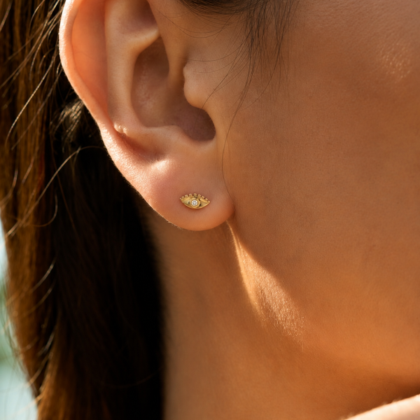 9k evil eye and diamond earrings