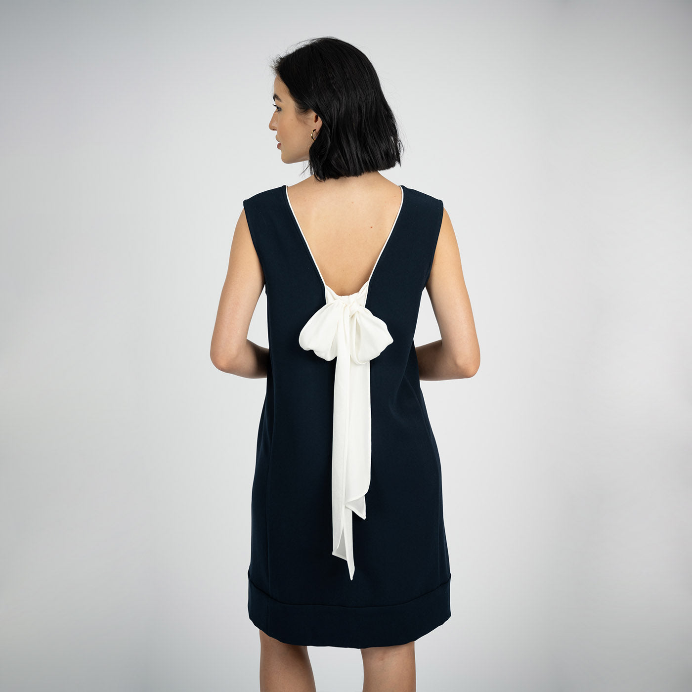 "Lauren” Acetate Sleeveless Mini Dress with a Bow
